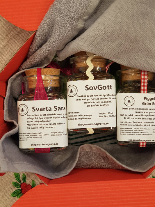 3 härliga teer och granhandduken i den fina presentlådan.